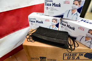 box of black disposable face masks made in usa