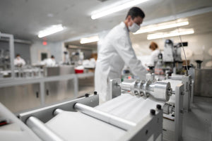 white disposable face mask material in production